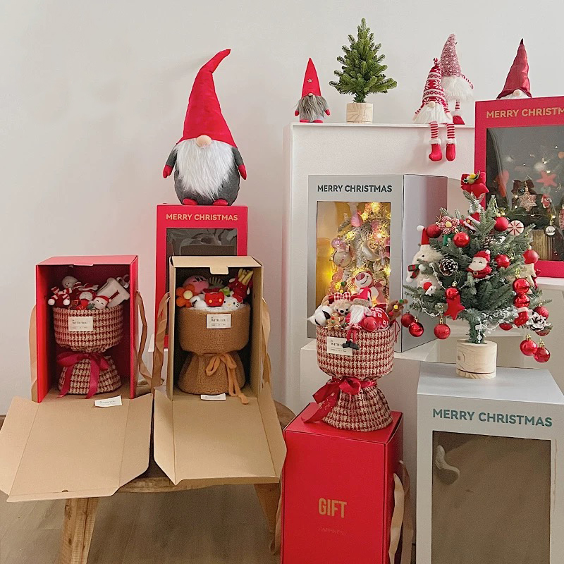 Cajas de regalo de flores transparentes con temática festiva